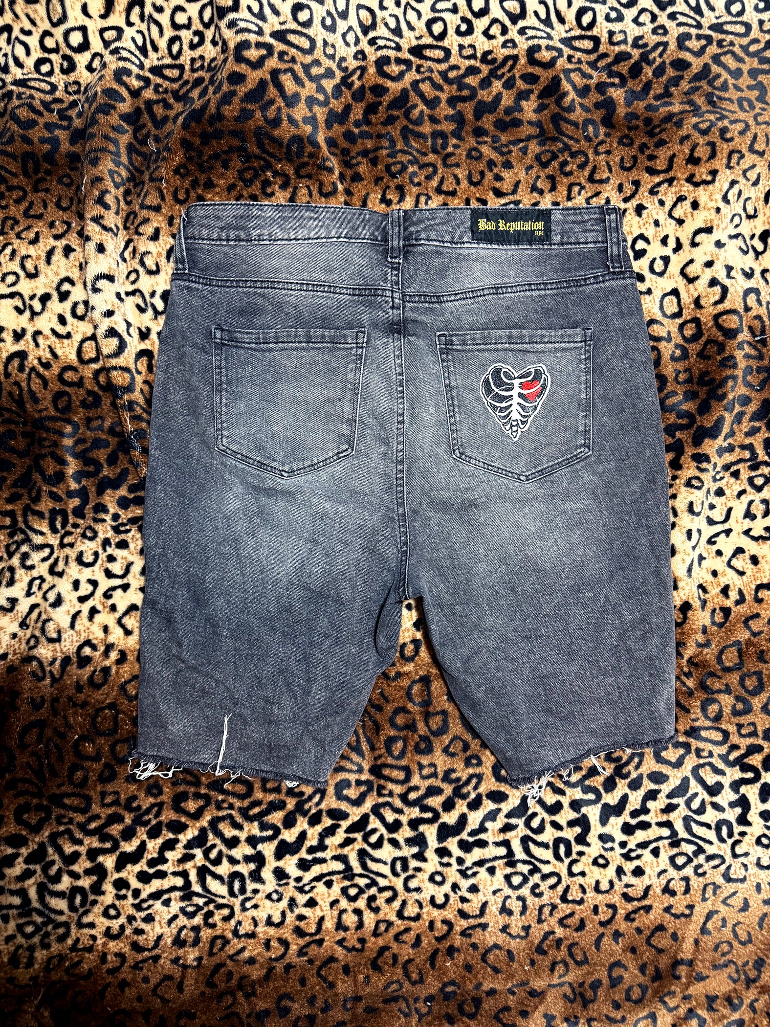Red Studded Distressed Denim Shorts