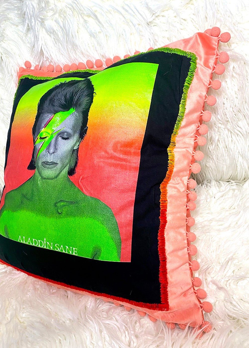 david bowie throw pillow on a white furry background detail view