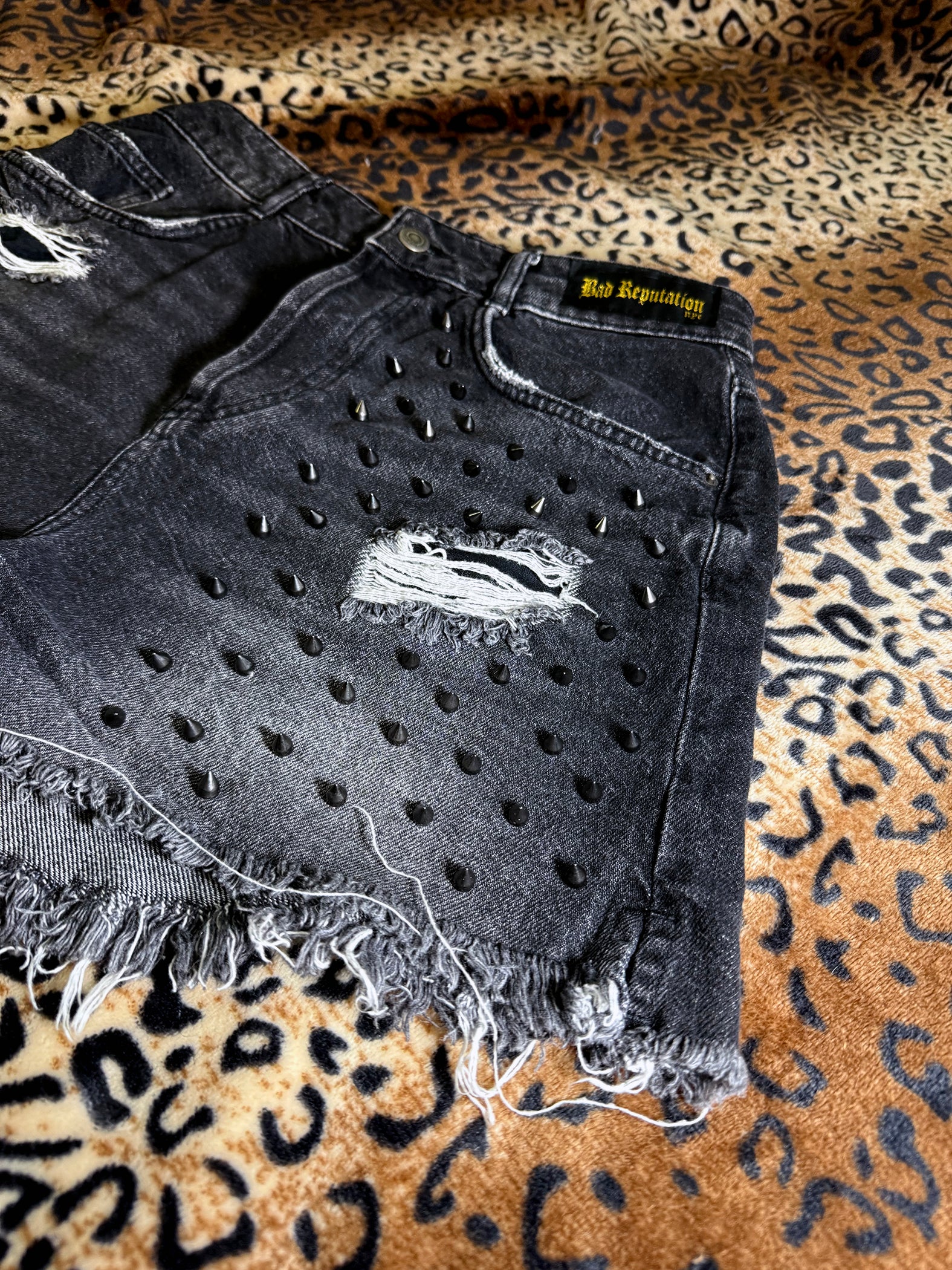 Skulls And Spikes Distressed Denim Shorts