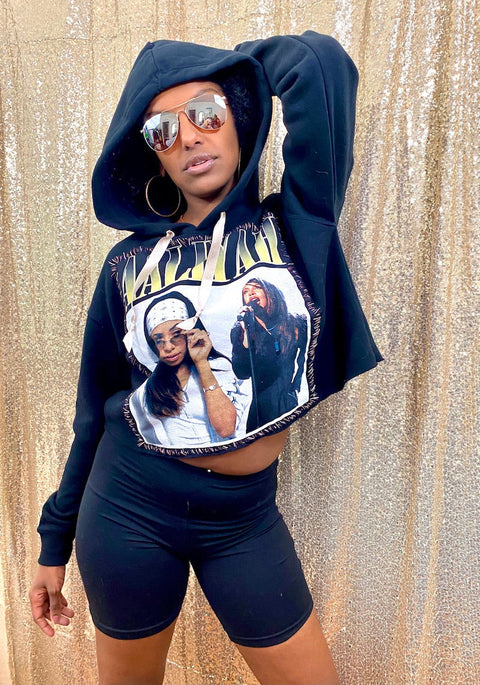 black aaliyah cropped hoodie on model with biker shorts and sunglasses