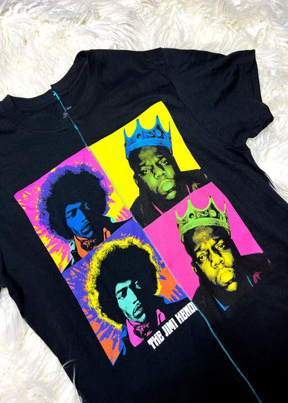 black t shirt on white furry background close up