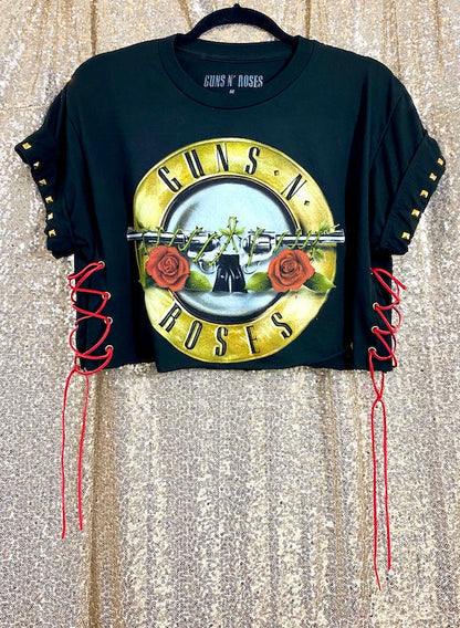 guns n roses black crop top in front of gold background