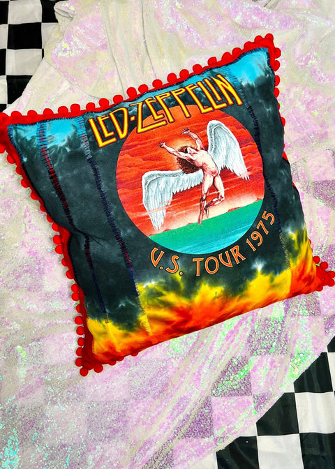 led zeppelin tie dye throw pillow on a sequin background top view