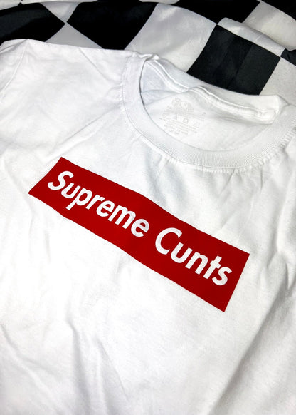 white t shirt on a black and white checkerboard background close up